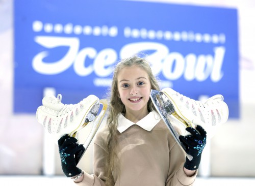 Two Girls skating on the ice