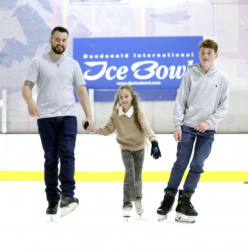 Two Girls skating on the ice
